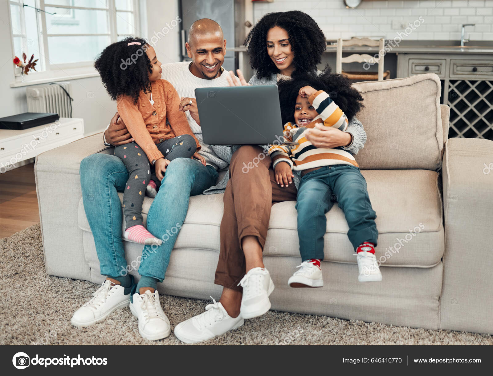 Happy Family Laptop Kids Sofa Video Comedy Movie Streaming Internet Stock Photo by ©PeopleImages 646410770