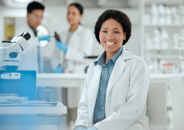 Stock image Feeling confident in my abilities. a confident young female scientist in her lab