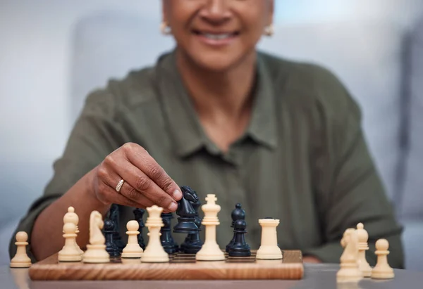 Strategy, moving and thinking with old woman and chess for challenge, competition and mental exercise. Relax, problem solving and smart with senior lady at home for board games, checkmate or contest.