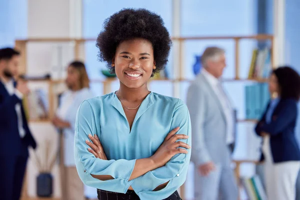 Black woman, business and leadership, smile with arms crossed in portrait with confidence in workplace. Team leader, management and professional female, ambition and happy with career success.