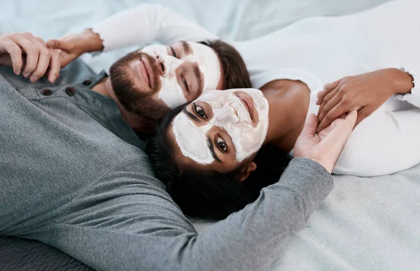 At home facials for when you need your spa fix. a young couple getting homemade facials together at home