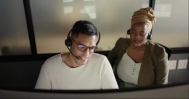 Call center, training and man coaching black woman coworker at customer service agency. Diversity, teamwork and crm, telemarketing manager consulting with agent at desk for customer support help line.