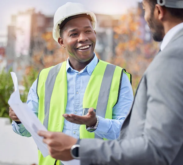 Engineer, men outdoor and blueprints for planning, happiness and real estate development. Architecture, male employees and leader with smile, documents and paperwork for partnership and collaboration.