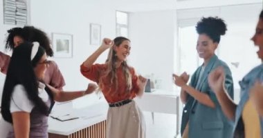 Dance, friends and woman with a business team in celebration while dancing together in an office. Success, freedom and diversity with a female employee group celebrating a deal, target or goal.