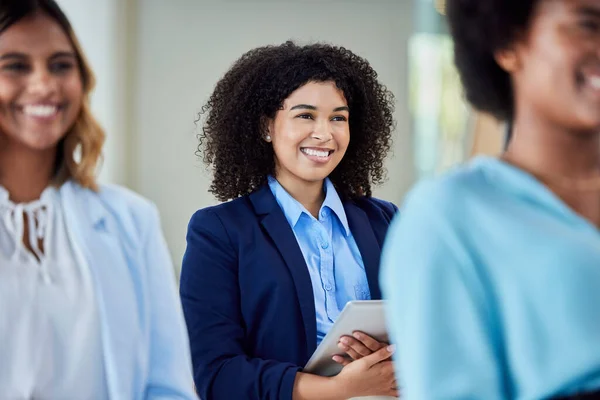 Stock image Business woman, tablet and audience in seminar for meeting, staff training or team planning at office. Happy female employee holding touchscreen in workshop with smile for presentation at conference.