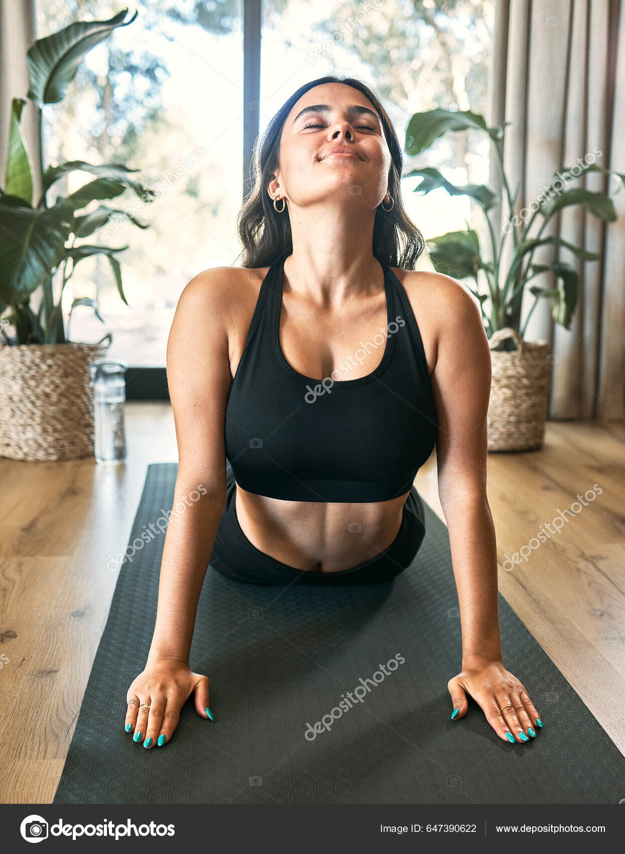 Yoga Meditation Cobra Stretch Woman Home Health Wellness Flexibility  Exercise Stock Photo by ©PeopleImages.com 647390622