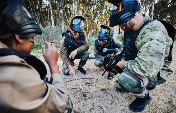 Paintball, team and military strategy with mission, teamwork and war zone with sports outdoor. Soldier group, people planning tactical game plan on battlefield with adventure and communication.