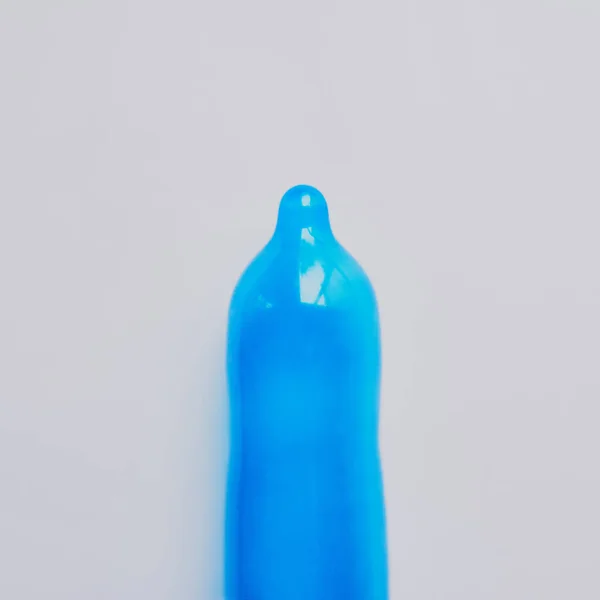 Always Responsible Studio Shot Blue Condom Placed Grey Background — Stock Photo, Image