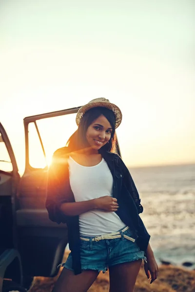 stock image Summertime is road trip time. a young woman enjoying a relaxing roadtrip