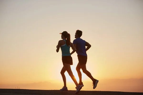 Stop Wishing Start Doing Silhouetted Couple Out Run Sunrise — Stock Photo, Image