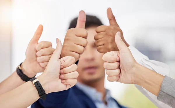 Business people, hands and thumbs up in teamwork agreement for good job, winning or success at the office. Hand of group employees showing thumb emoji, yes sign or like in team support at workplace.