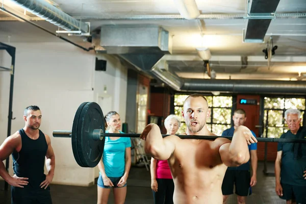 Stronger Every Day Man Lifting Weights While Group People Background — Stock Photo, Image