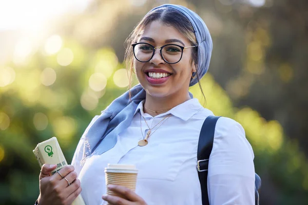 stock image Study, portrait and happy woman at park, university campus or outdoor distance learning, education and reading. Muslim, islamic or arabic student with school book for research or college knowledge.