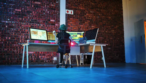 Coding, hacker woman and computer monitor for cybersecurity, programming and data. Analytics code, dashboard and technology of a female working on futuristic, iot and software database at night.