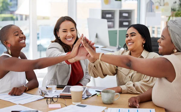 Teamwork, business women and high five in office for team building, motivation and collaboration. Cooperation, celebration and group of happy people or staff celebrating goals, success or achievement.