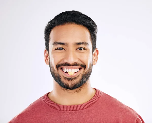 stock image Vitamin pill, man and portrait with health supplement, prescription and wellness tablet. Isolated, studio background and male model face with nutrition, healthcare and healthy medication with a smile.