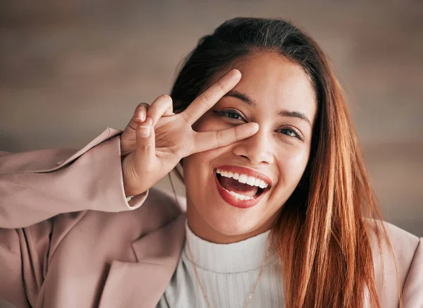 Portrait, smile and woman with peace sign, excited and happiness with joy, carefree and cheerful. Face, female and happy lady with hand gesture, facial expression and emoji with v symbol and review.