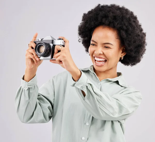 stock image Laughing, camera photographer and black woman in studio isolated on a white background. Photography, professional and funny person or female ready to start filming, photoshoot or taking picture