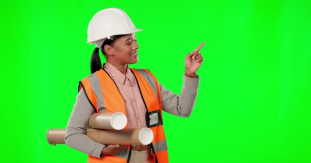建筑师女性 在绿色的屏幕上指指点点和微笑 标志和选择工作室背景 小企业业主肖像画中的女工程师 建筑或施工技巧及建议 — 图库视频影像