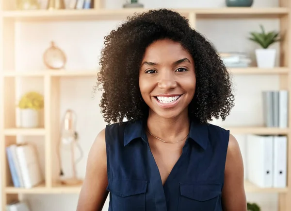 stock image Ive reached great fulfillment in my career. Portrait of a confident young businesswoman standing in an office