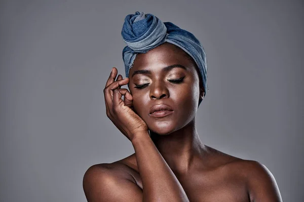 I dont need filters, I was born flawless. a beautiful young woman wearing a denim head wrap while posing against a grey background