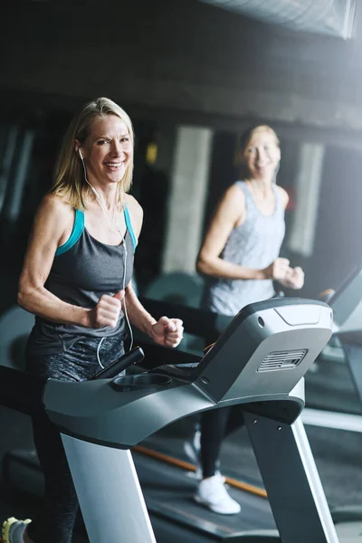 stock image Running is the best thing for your body. mature women working out in the gym