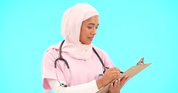 Woman Doctor Writing Clipboard Studio Information Medical Record Islamic Muslim — Stock Video