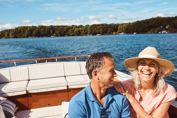 stock image Work hard, relax harder. a mature couple enjoying a relaxing boat ride