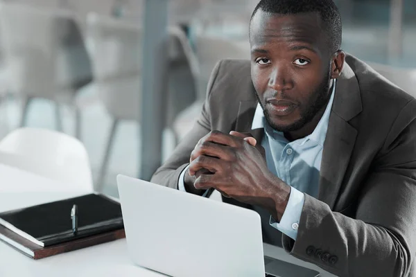 stock image My biggest motivation is to keep challenging myself. a young businessman working at his desk