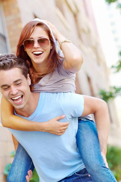 Fond Memory Making Happy Girlfriend Getting Piggyback Her Boyfriend Stock Image
