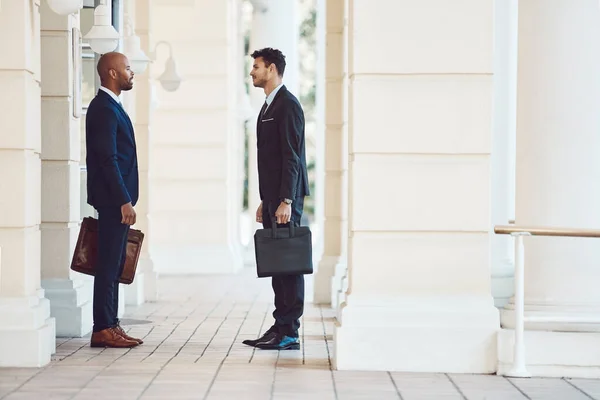 stock image Meet with people who make it happen. two businessmen talking in the city