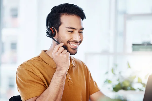 stock image Happy man with smile, callcenter and phone call with contact us, headset and microphone with CRM. Male consultant, communication and tech with customer service job, telecom and help desk agent.