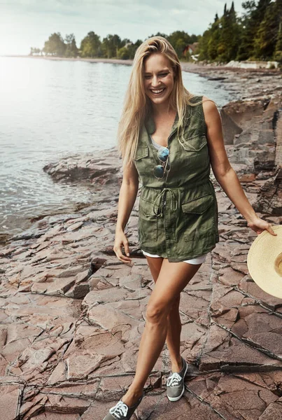 stock image Theres nothing more gorgeous than this day. an attractive young woman spending a day at the lake