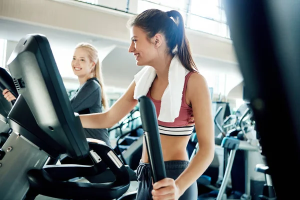 stock image Cardio keeps them trim. attractive young women working out on treadmills at the gym