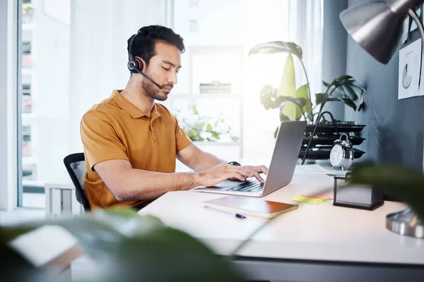 stock image Customer service laptop, office focus and man typing response for contact us, communication or ecommerce. Telemarketing sales pitch, e commerce or male callcenter consultant working on online support.