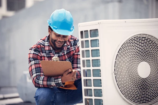 Air conditioner, clipboard and technician man inspection, maintenance and safety check for electrical power generator. Happy electrician, african person or contractor, checklist and roof engineering.