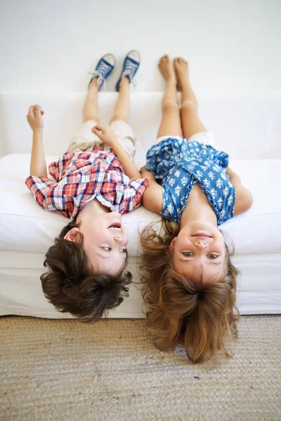 Bored Never Young Brother Sister Playfully Hanging Upside Edge Sofa — Stock Photo, Image