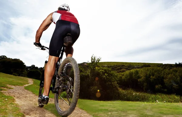 Hes Path Fitness Rearview Shot Sporty Man Cycling Outdoors — Stock Photo, Image