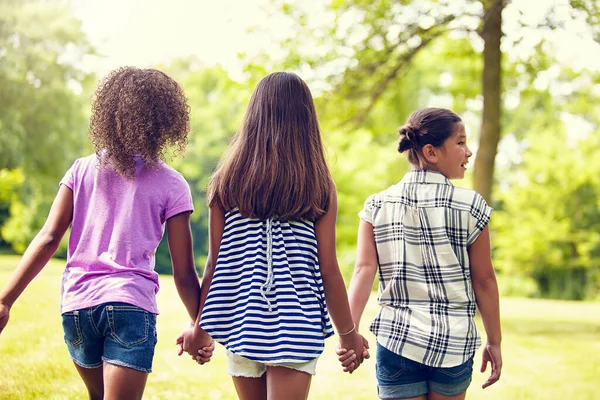 stock image Best friends in the park. Rearview shot of little girl best friends outdoors