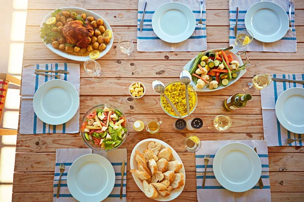 stock image Let the nom nom begin. High angle shot of a lunch table laid out with delicious food