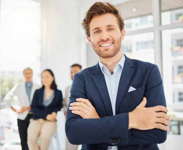 Corporate, happy and portrait of business man in office with confidence, pride and crossed arms. Leadership, corporate and male entrepreneur with smile for success, company mission and happiness.