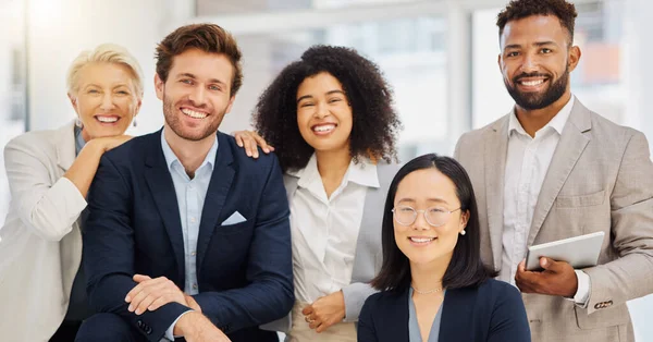 Teamwork, happy and portrait of business people in office with confidence, pride and motivation. Professional, diversity and group of men and women smile for success, company mission and happiness.