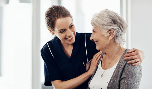 Her wellbeing is my first priority. a female nurse caring for a senior woman