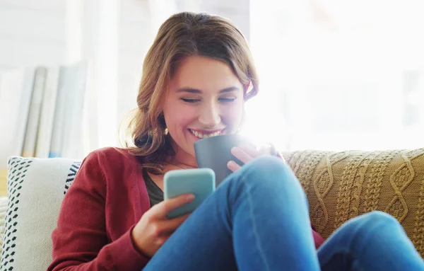 Relaxation Station Attractive Young Woman Sitting Using Her Cellphone While — Stock Photo, Image