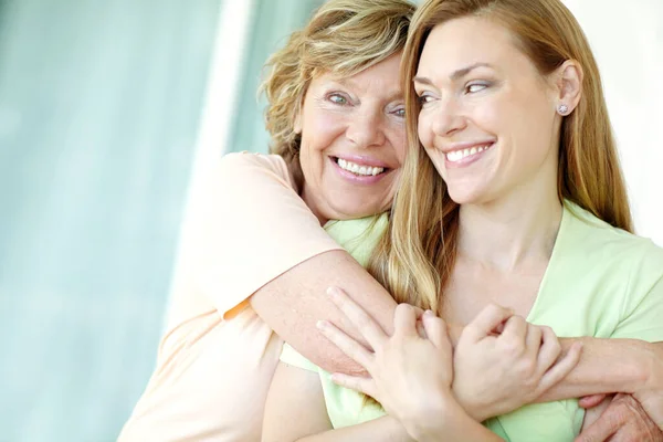 Receiving Big Hug Mom Beautiful Woman Receiving Affectionate Hug Her — Stock Photo, Image