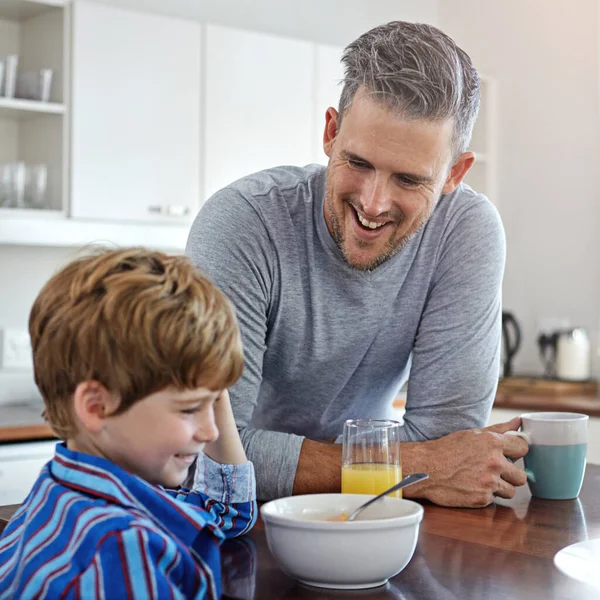 stock image Dad makes the best breakfast. a mid adult man and his son at home in the morning