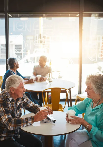 stock image Get your feelings out in the open, thats my advice. a senior couple out on a date at a coffee shop