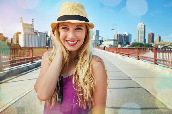 stock image Happiness is a state of mind. a smiling young woman walking around the city in the summertime