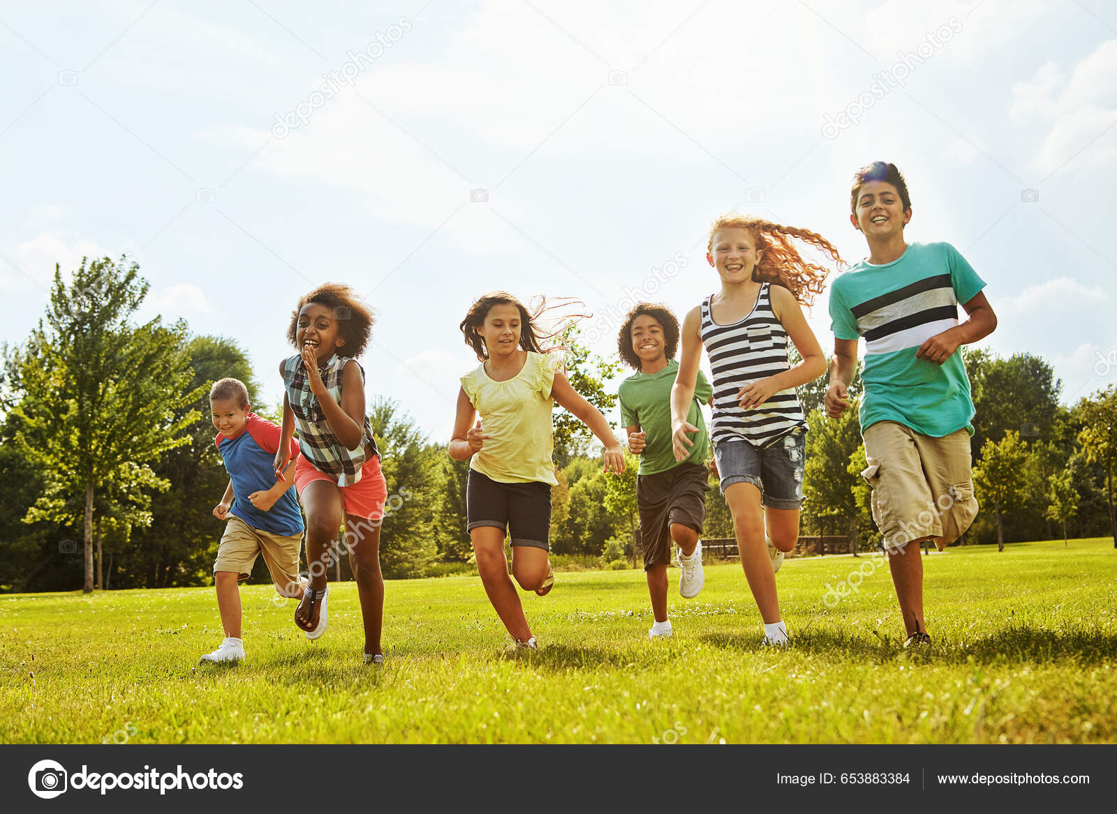 Running Day Fun Group Diverse Happy Kids Playing Together — Stock Photo ©  PeopleImages.com #653883384, image size:1600x1167