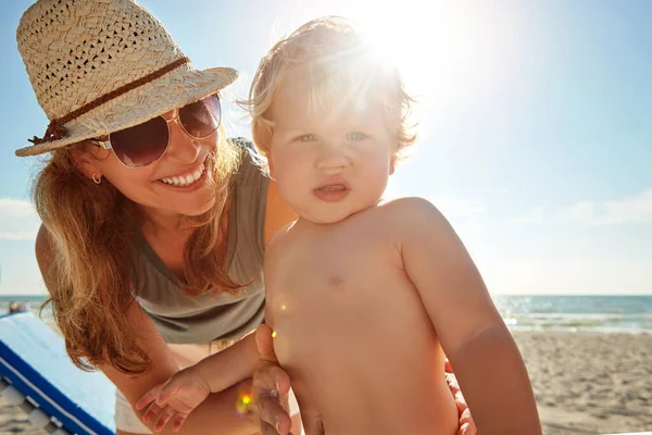 stock image Spending quality time at the beach. a single mother spending the day at the beach with her little boy